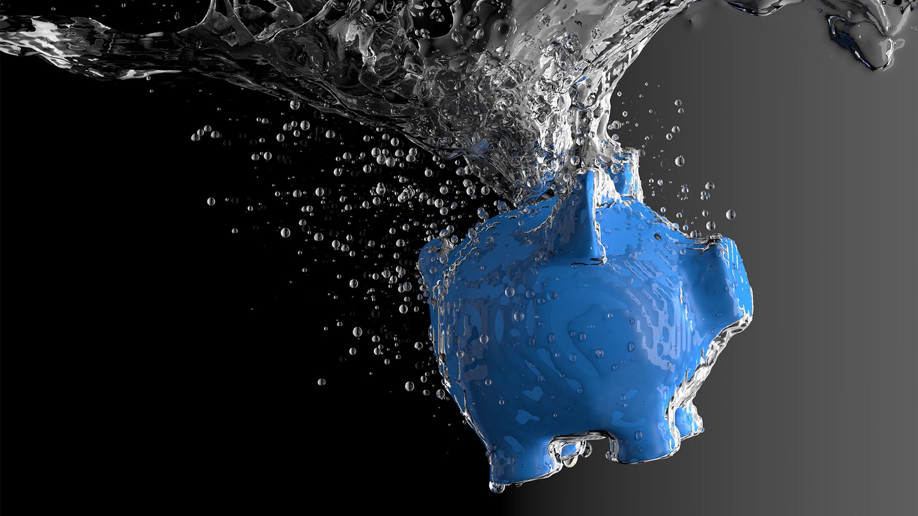 Blue piggy bank being dropped into the water