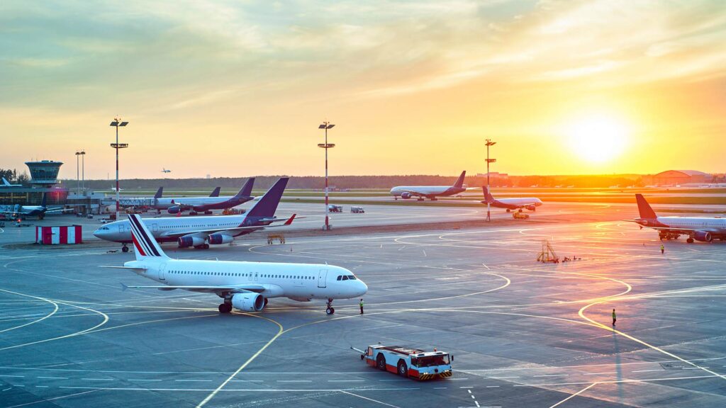 Airport with planes being loaded