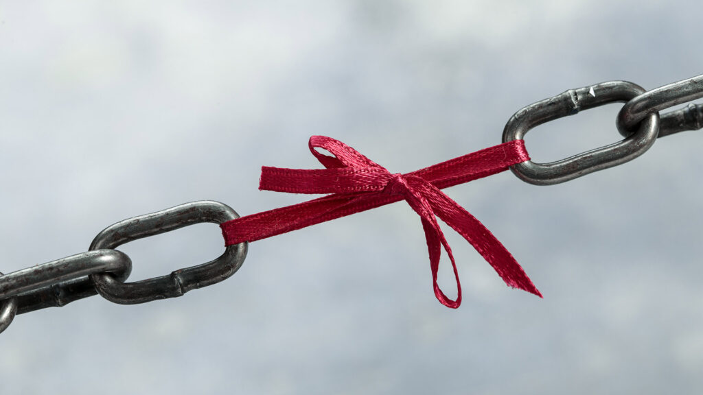Chain held together with weak ribbon
