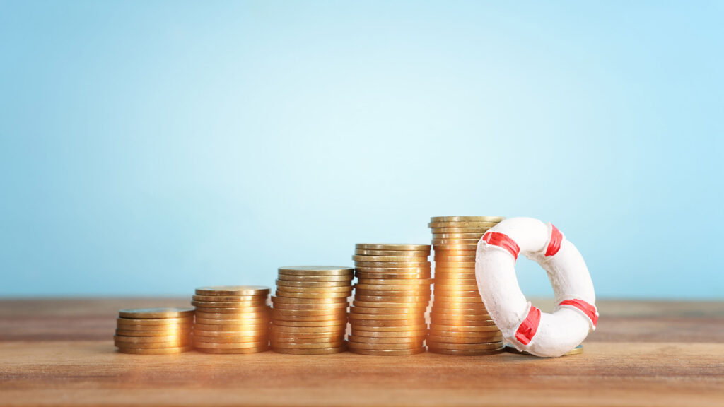 Stacks of coins increasing with a life buoy
