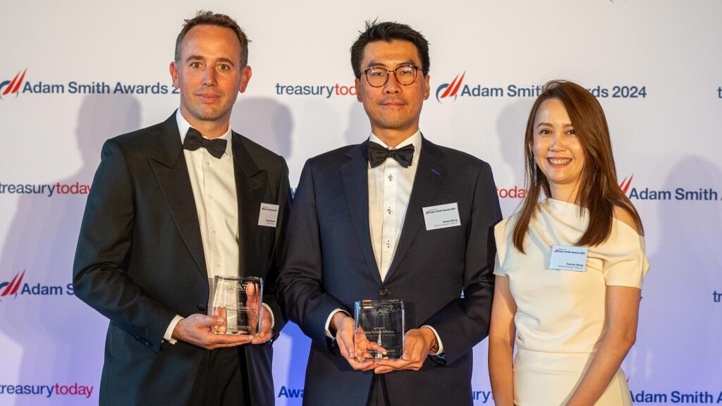 Photo of Simeon Stevens, Bank of America, and Daniel Wong and Carrine Wong, British American Tobacco.