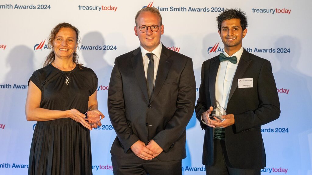 Photo of Nevin Lettens and Andy Hottowy, eBay and Rajesh Dhulashia, J.P. Morgan.